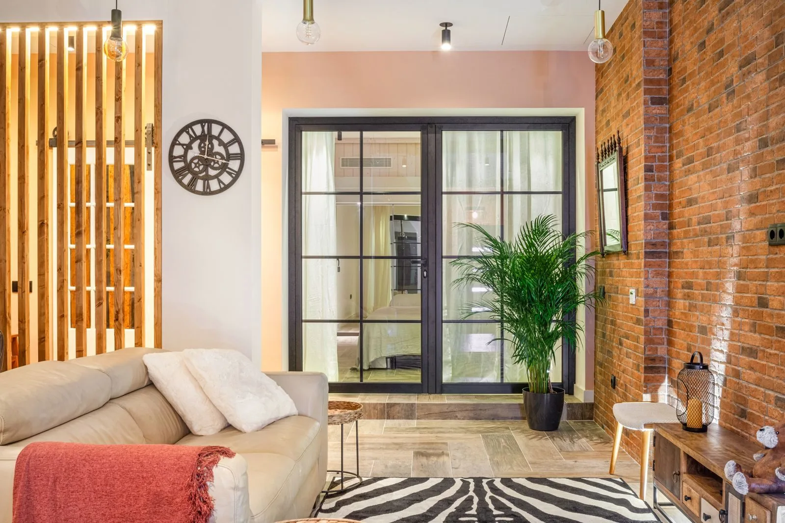 Wood-slat room divider — Amoreira loft by Maya's Homes