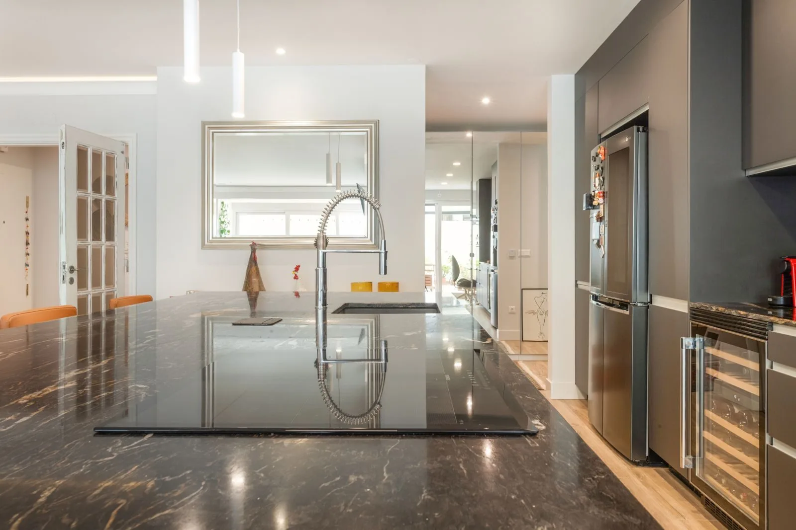 Kitchen island stovetop — Parede renovation by Maya's Homes