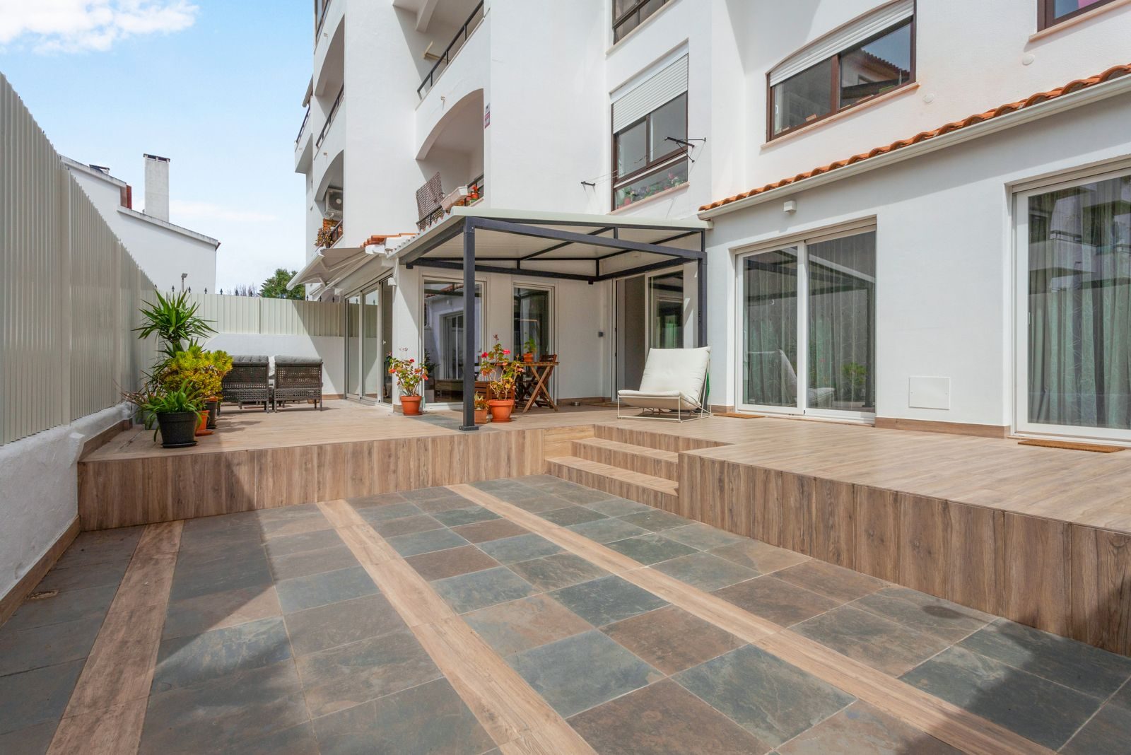 After — wooden deck with pergola