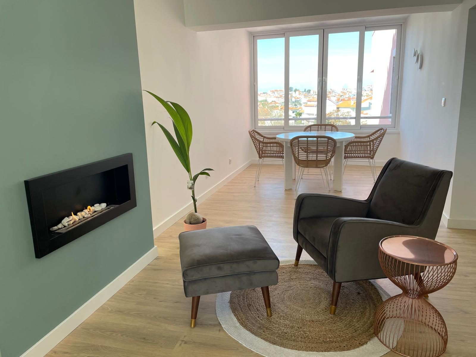 Living and dining area with fireplace