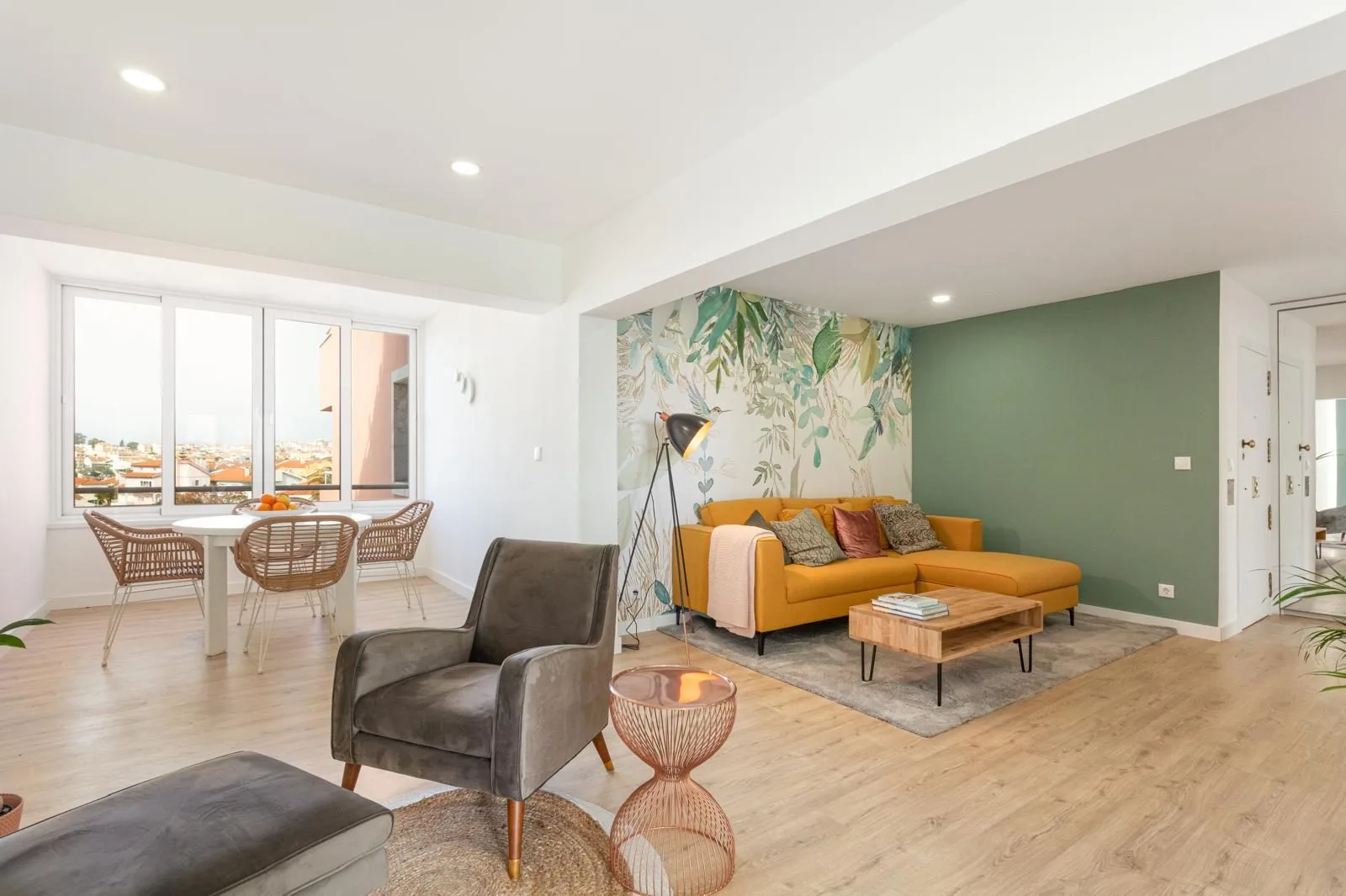 Living room with feature wallpaper — Rebelva renovation by Maya's Homes