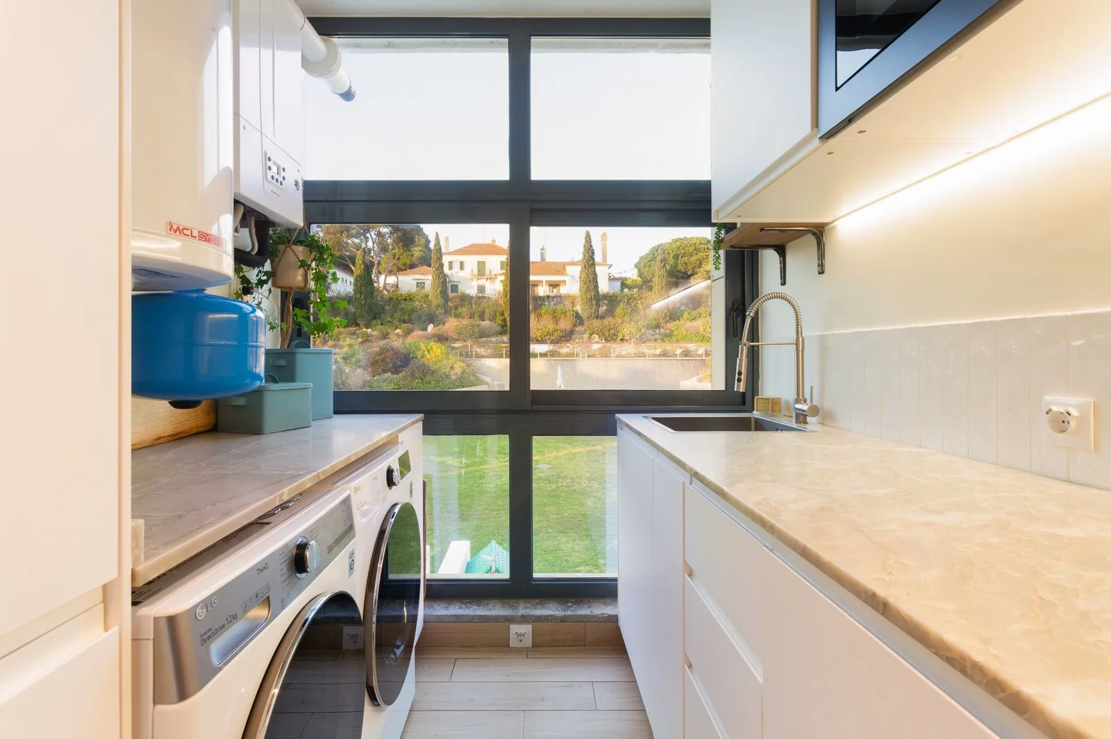 Kitchen with SMEG range — Riviera villa renovation by Maya's Homes