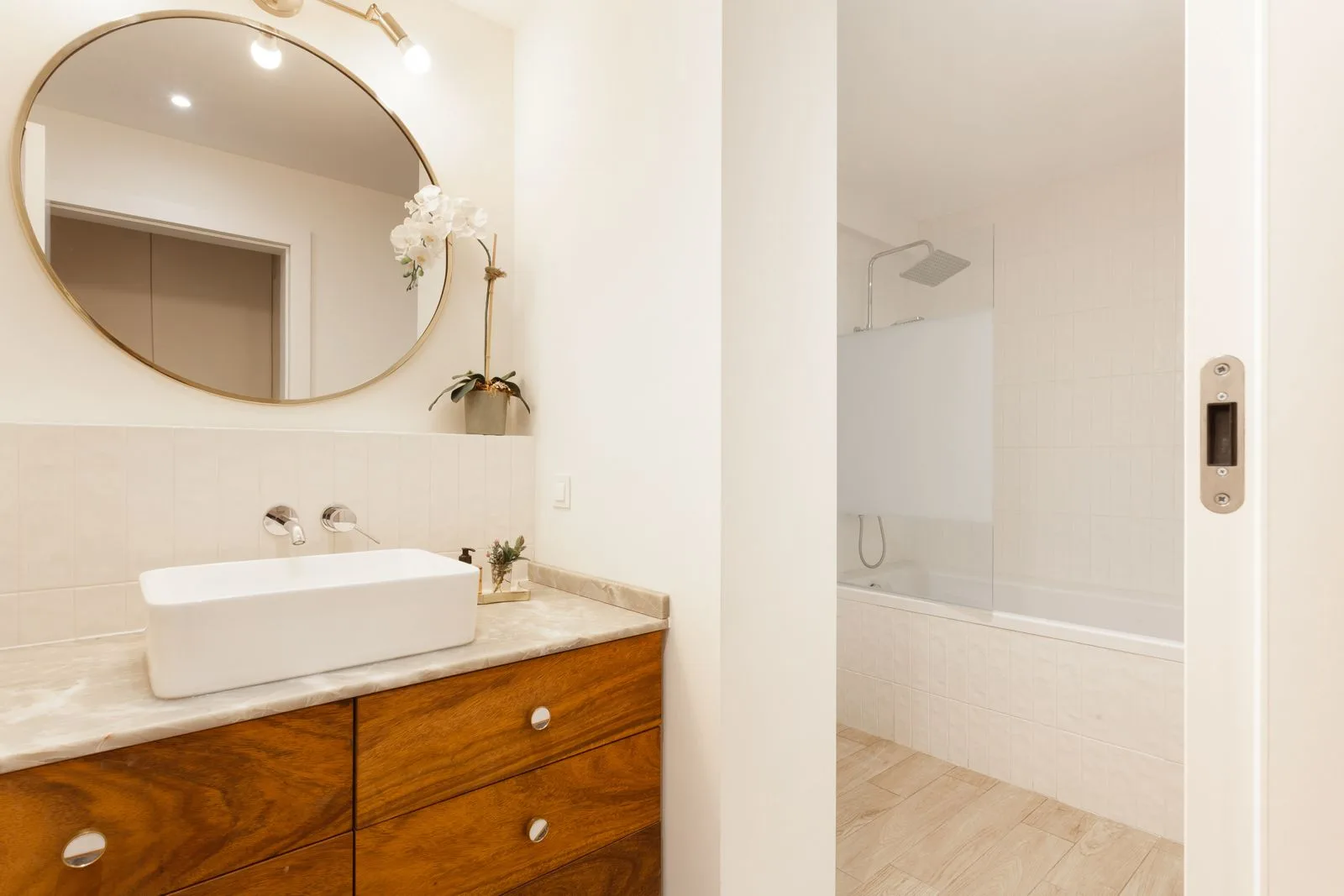 Second bathroom with walnut vanity — Riviera villa by Maya's Homes