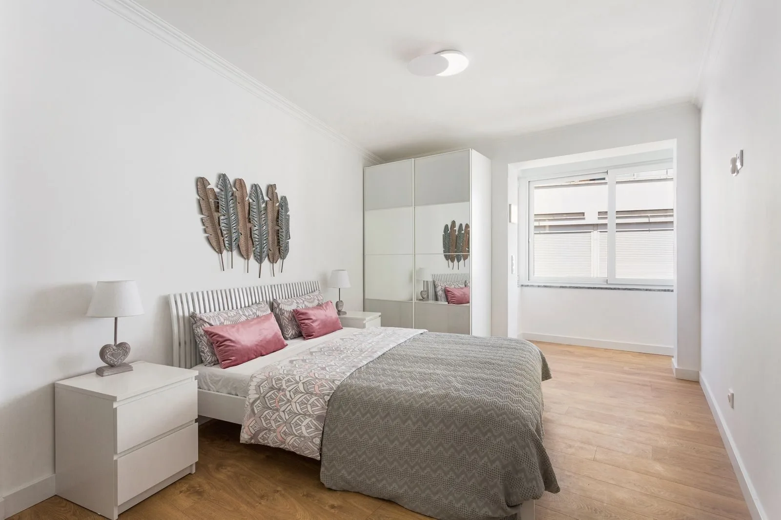 Master bedroom with wall art — Figueiras renovation by Maya's Homes