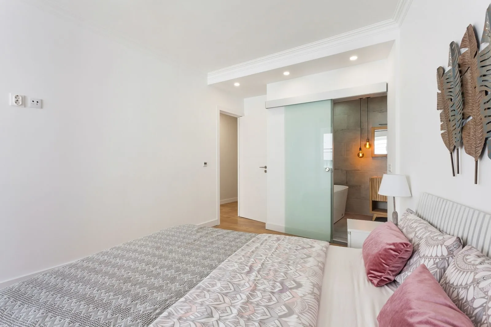 Master bedroom with mirrored wardrobe — Figueiras renovation by Maya's Homes