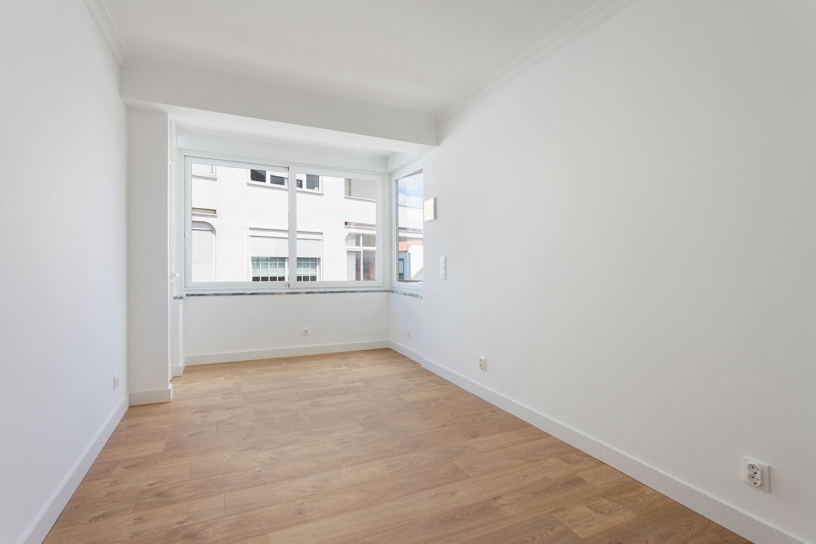 Second bedroom with large window